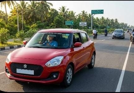 Red training car on the road